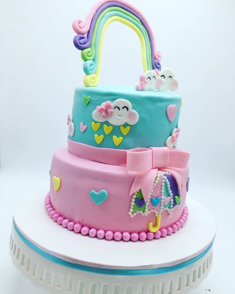 rainbows & clouds cake by Renata Café & Pastries